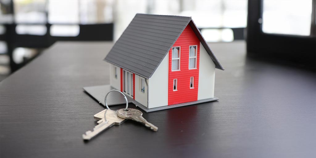 Maison miniature avec clés – informations pour propriétaires concernant le réseau fibre optique FTTH de Pully4net à Pully